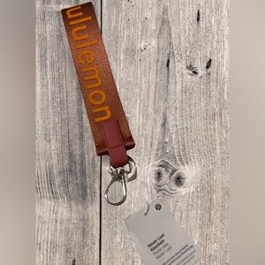 LULULEMON never lost keychain